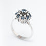 White gold double entourage ring with blue topaz and diamonds
