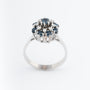 White gold double entourage ring with blue topaz and diamonds