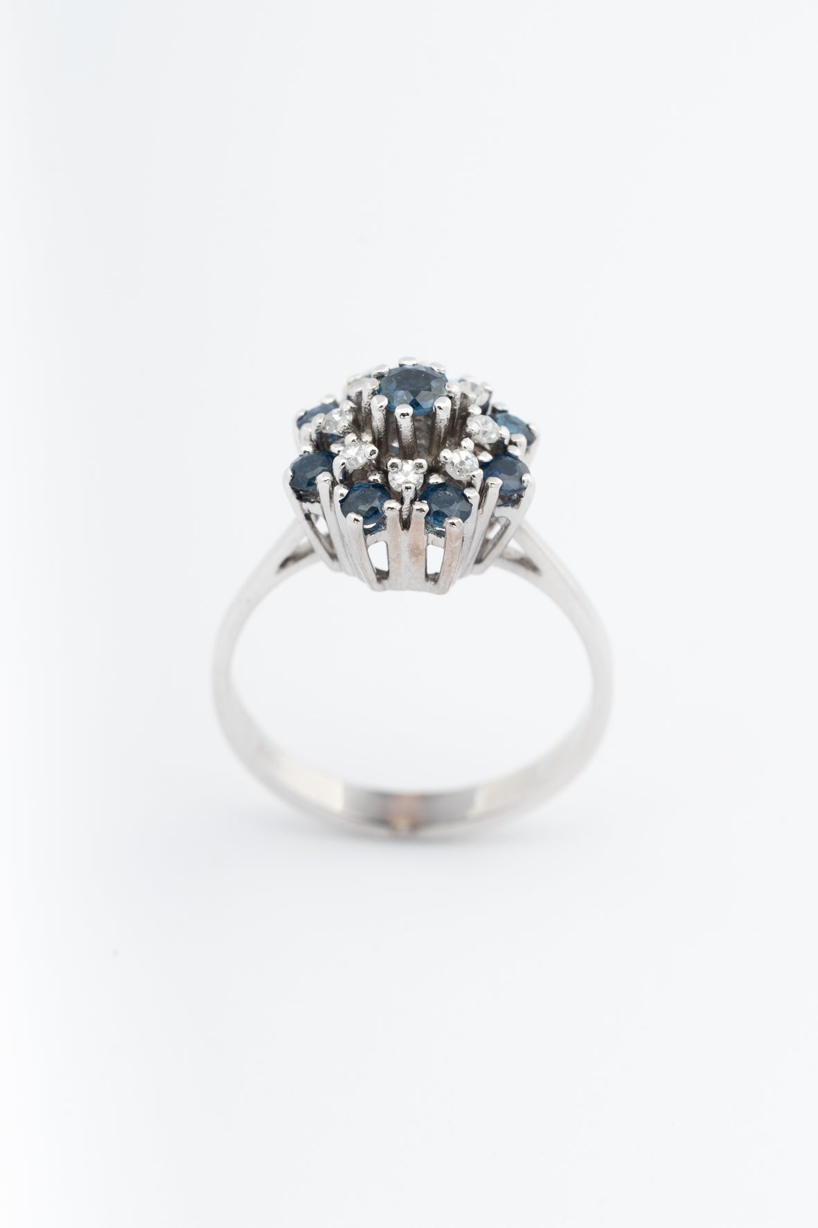 White gold double entourage ring with blue topaz and diamonds