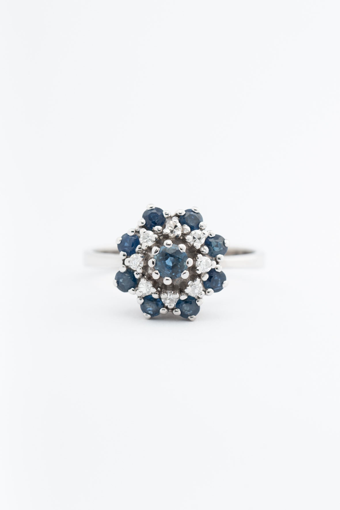 White gold double entourage ring with blue topaz and diamonds