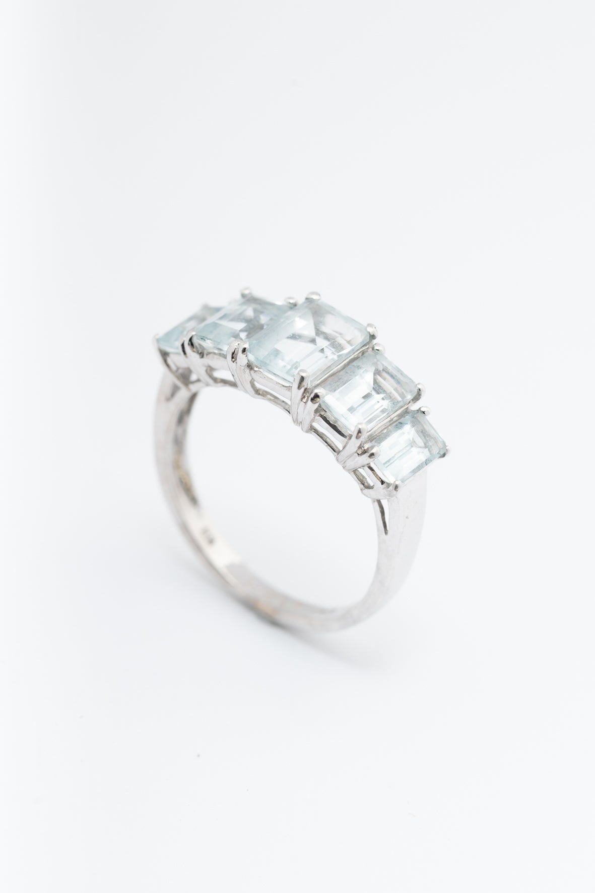 Row ring with aquamarines (BWG)