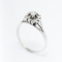 White gold solitaire ring with a brilliant