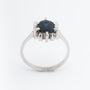 White gold entourage ring with a sapphire and diamonds (Bwg)