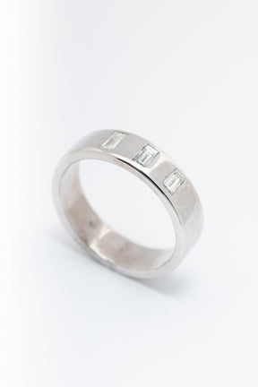 White gold band ring with diamonds