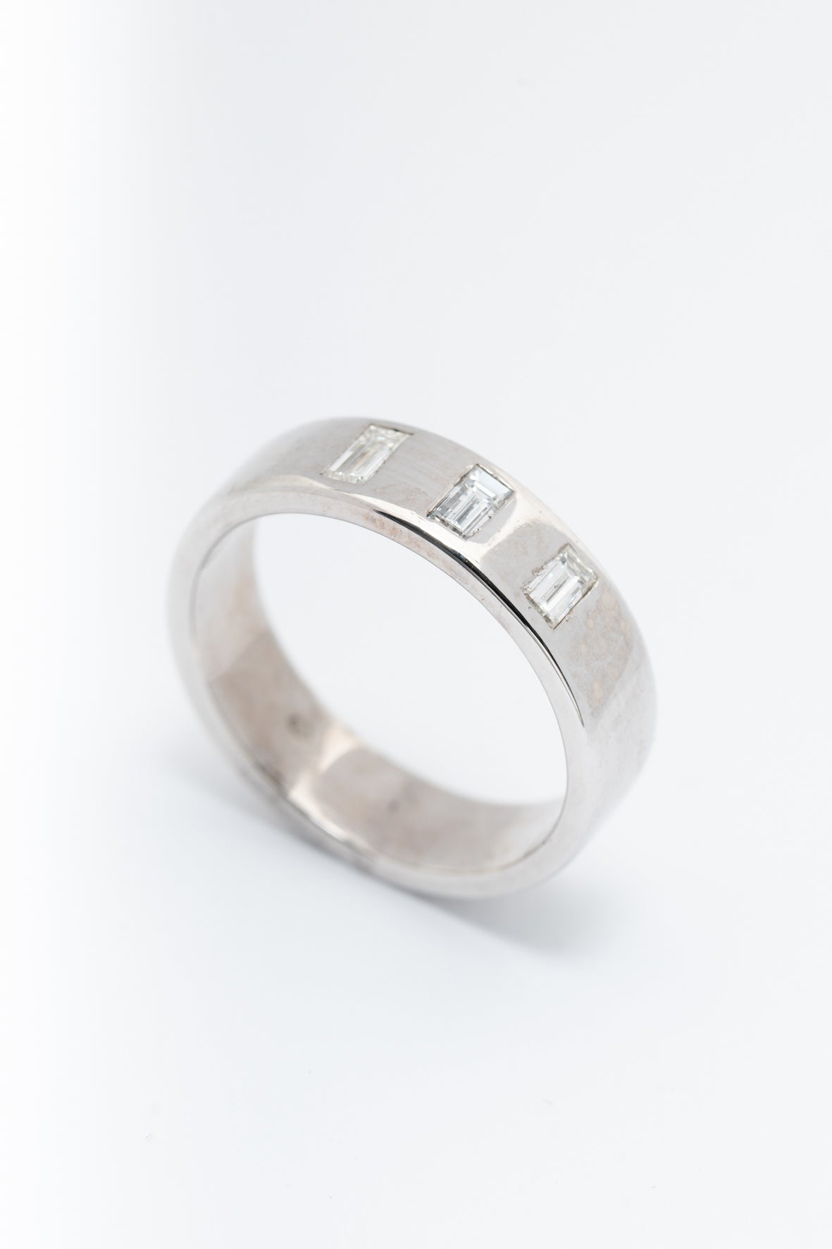 White gold band ring with diamonds
