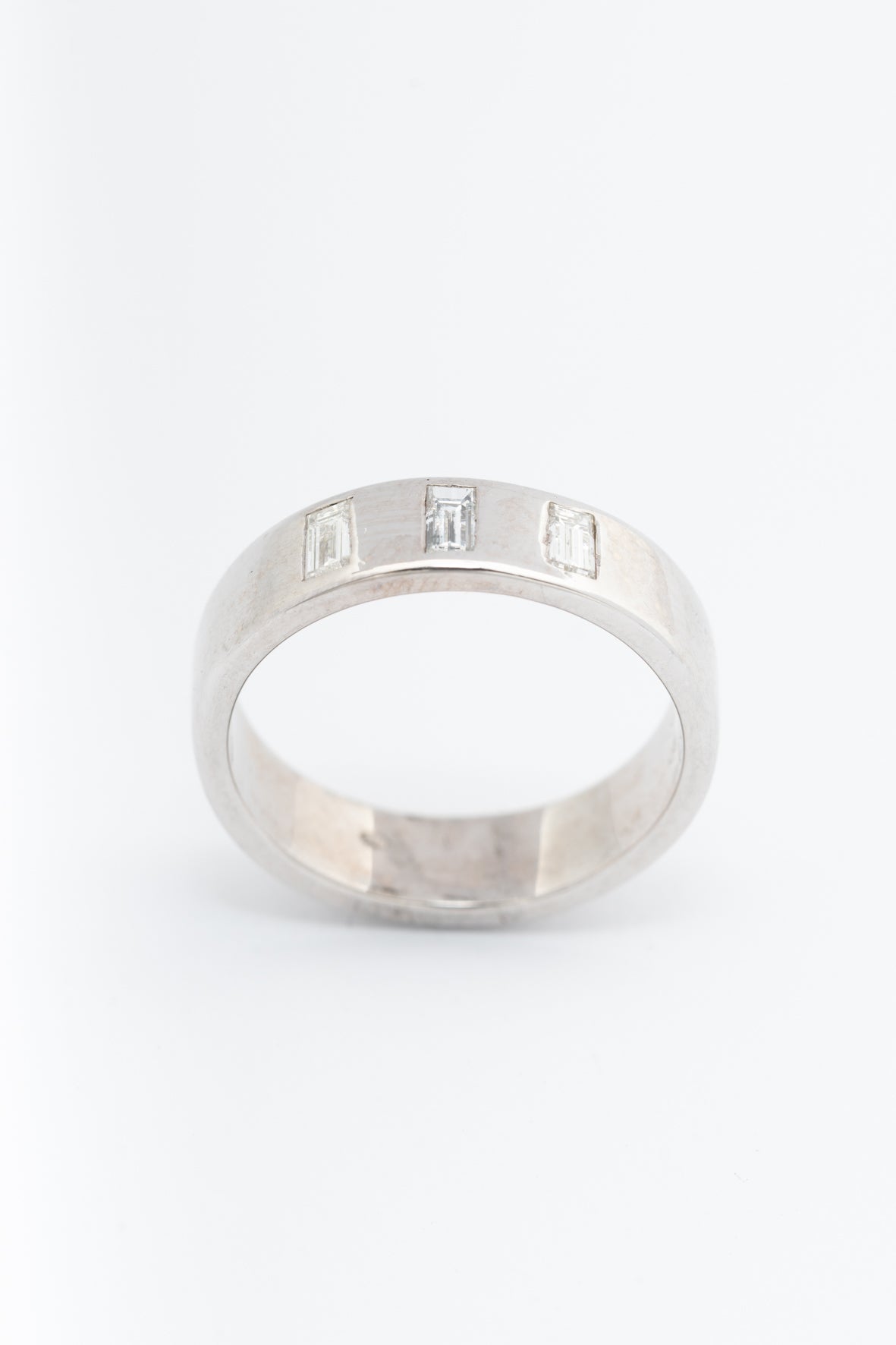 White gold band ring with diamonds