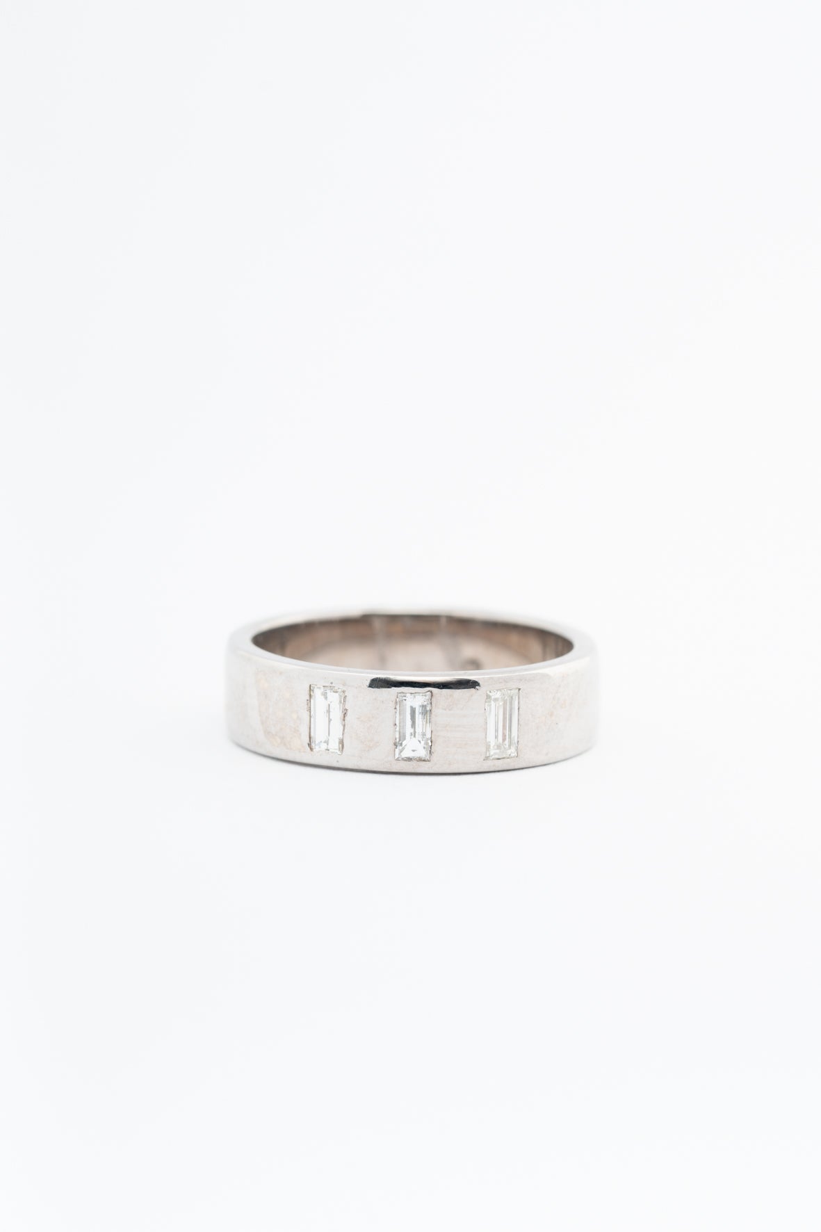 White gold band ring with diamonds