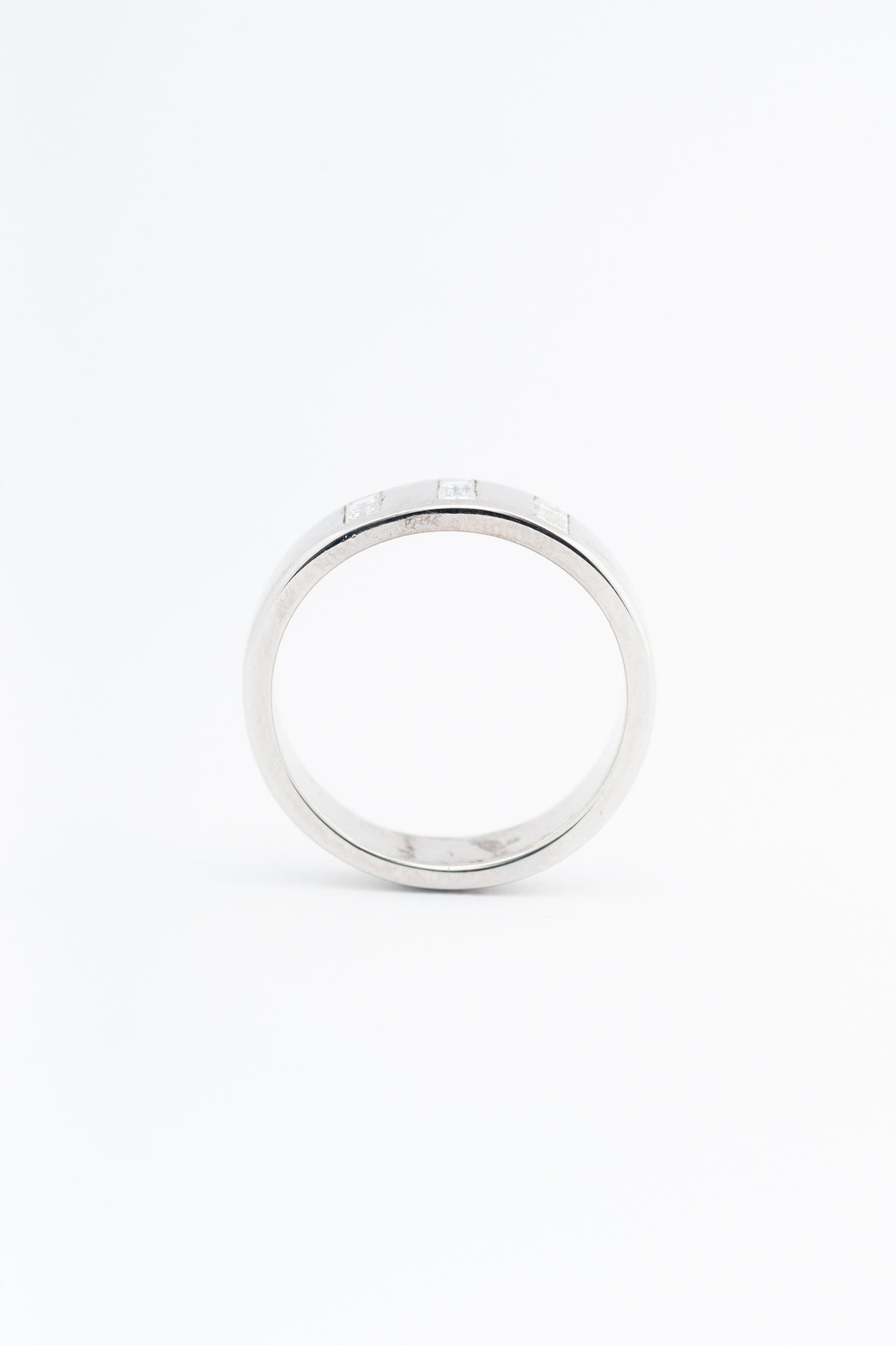 White gold band ring with diamonds