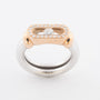 18 krt. wit/rosé gouden ring met een swinging diamond en briljanten