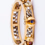 Antique gold bracelet with gemstones
