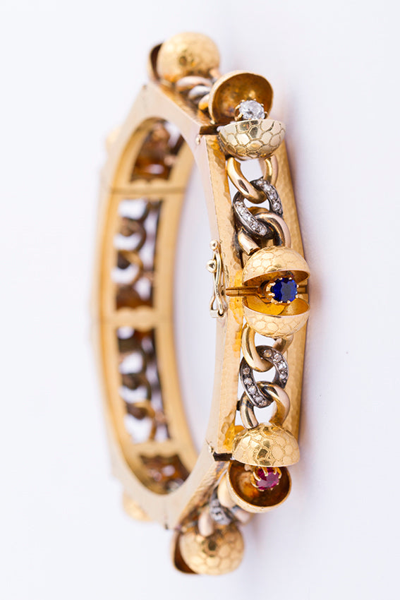Antique gold bracelet with gemstones