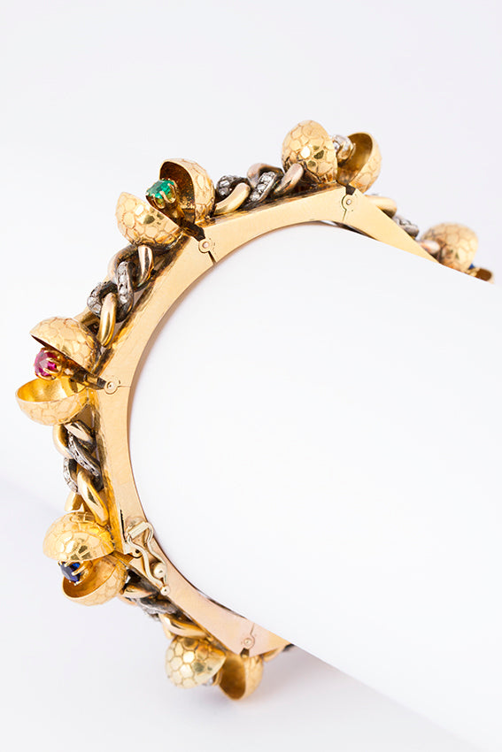 Antique gold bracelet with gemstones