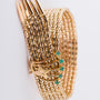 Gold bracelet with emerald
