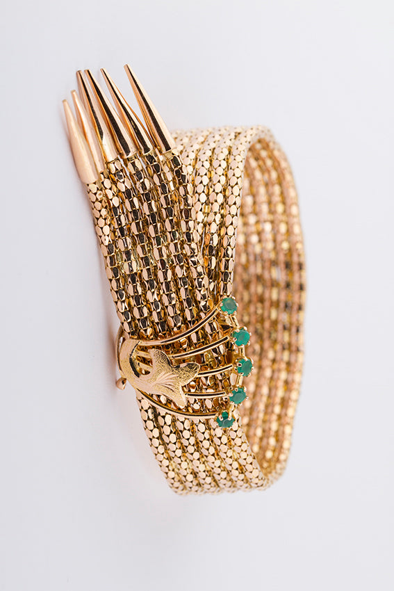 Gold bracelet with emerald