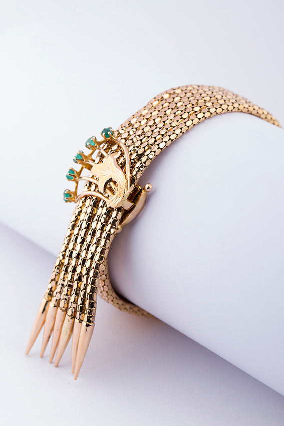 Gold bracelet with emerald
