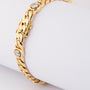 Solid link bracelet with diamonds