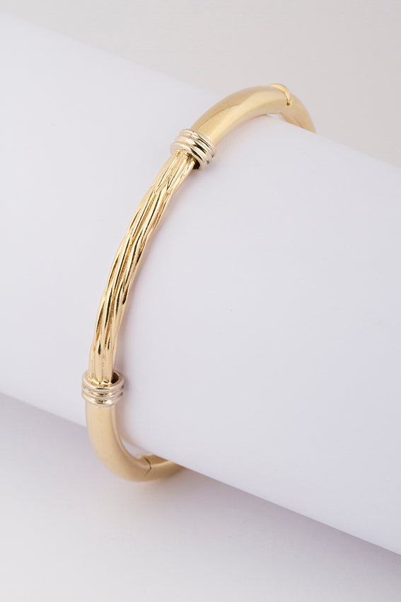 Golden twisted slave bracelet