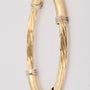Golden twisted slave bracelet