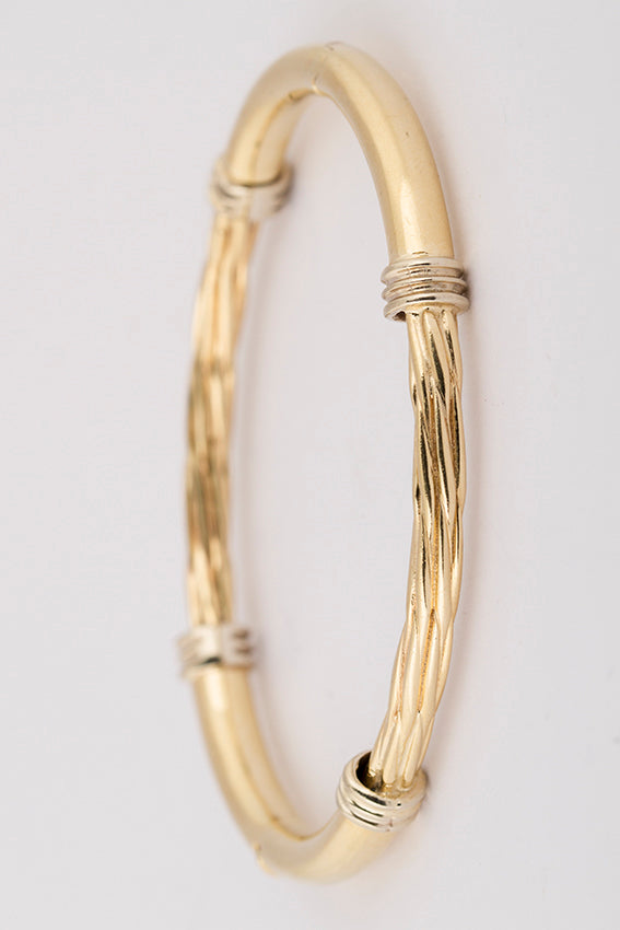 Golden twisted slave bracelet