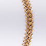 Gold link bracelet with filigree