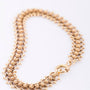 Gold link bracelet with filigree