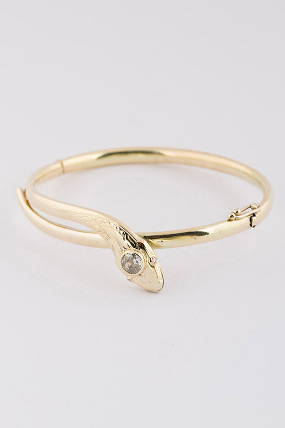 Gouden slangen armband met een briljant