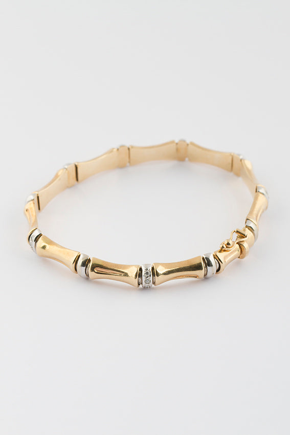Wit/geel gouden bamboe armband met briljant