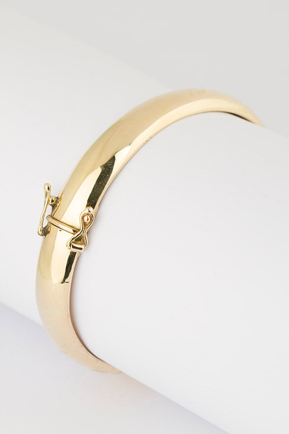 Brede gouden slaven armband