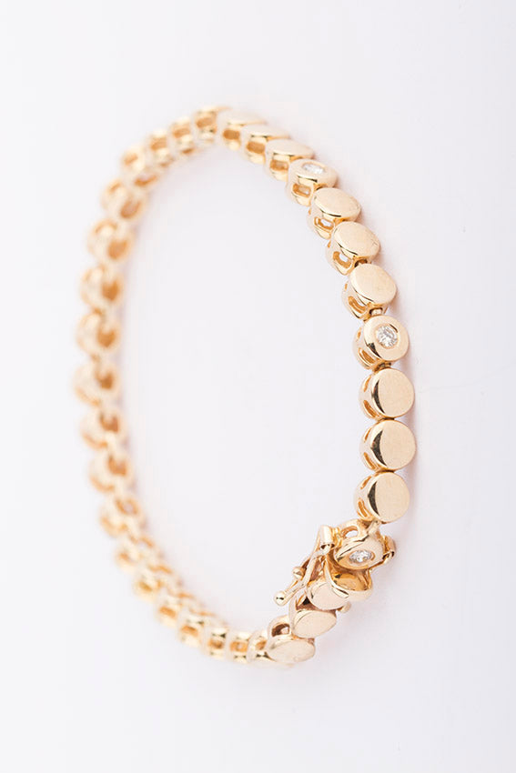 Gouden schakel armband met 8 briljanten