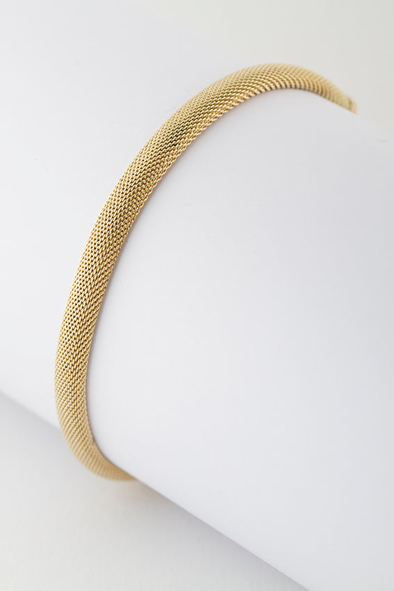 Gouden gevlochten armband