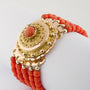 Antique blood coral bracelet with traditional costume clasp