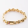 Massief gouden armband met robijn