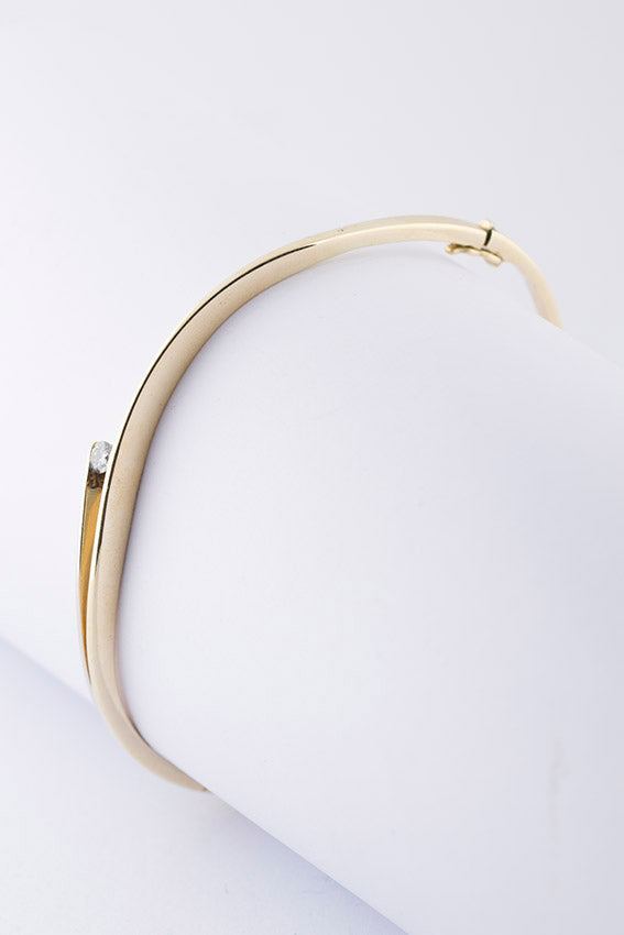 White/yellow gold slave bracelet with brilliant