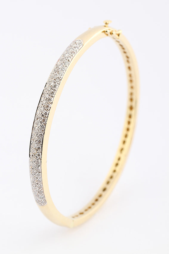 Gold slave bracelet with diamonds