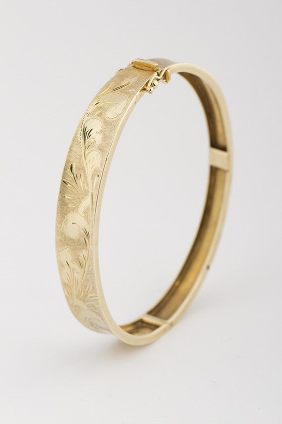 Gold engraved slave bracelet