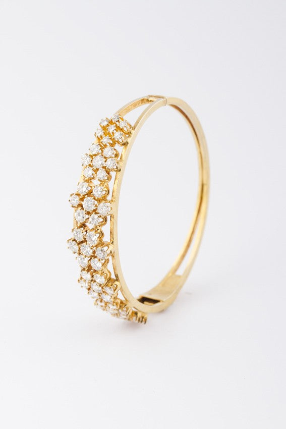 Gouden slaven armband met briljanten