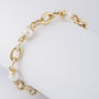 Gold link bracelet with cultured pearls