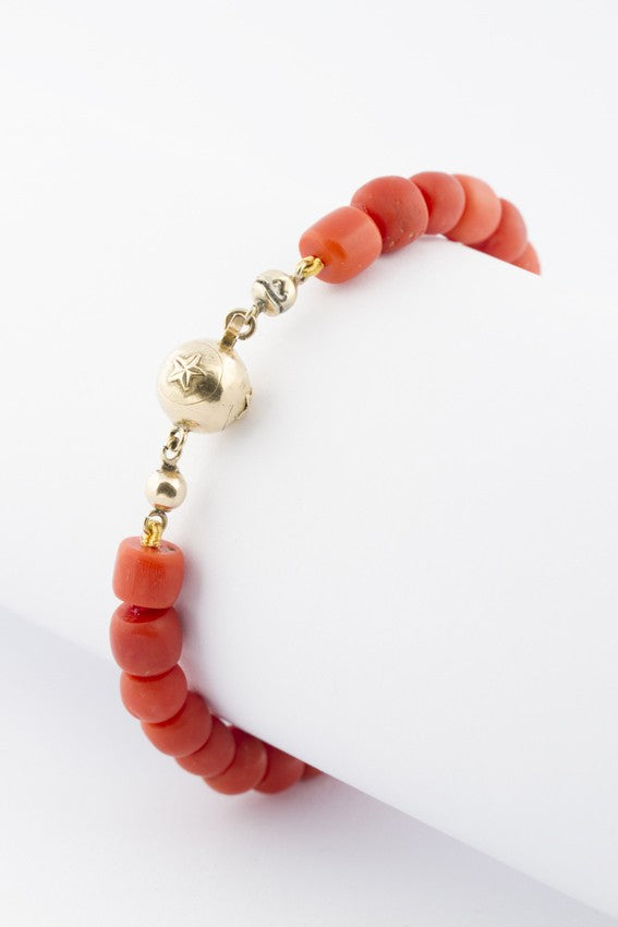 Red coral bracelet with gold clasp