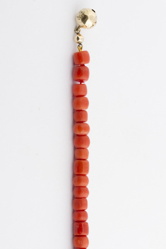 Red coral bracelet with gold clasp