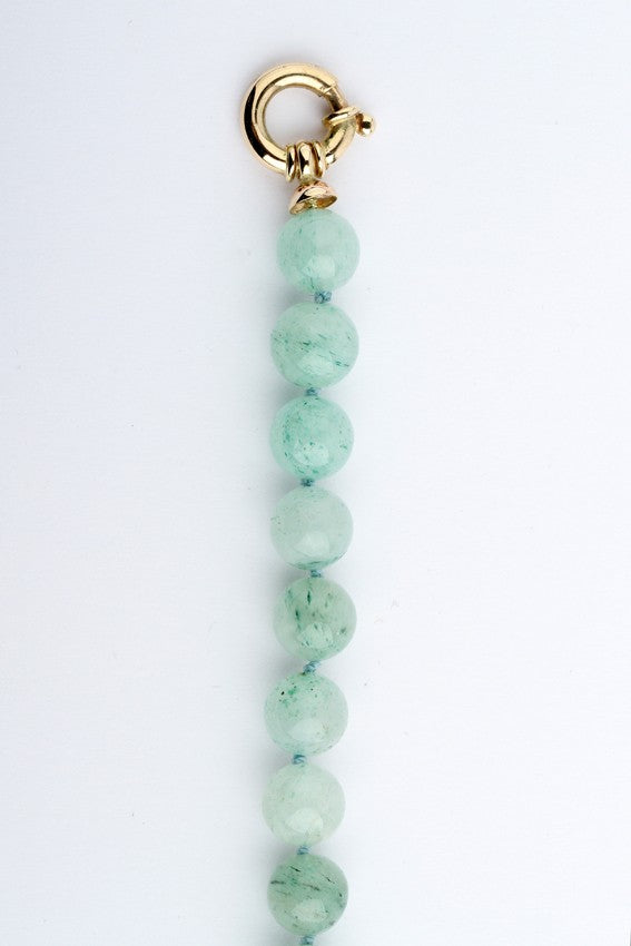 Jade bracelet with gold clasp
