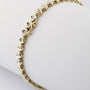 Gold tennis bracelet with diamonds