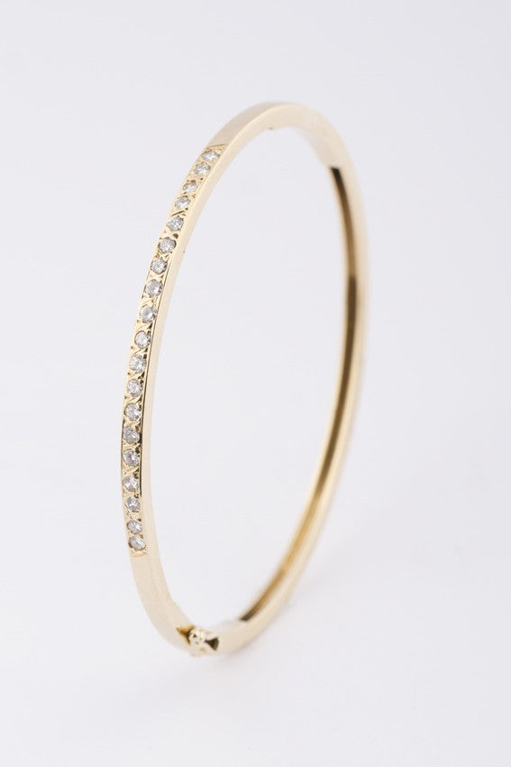 Gold slave bracelet with diamonds