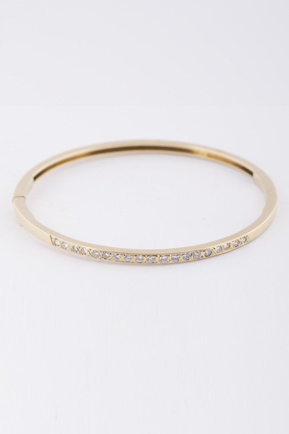 Gold slave bracelet with diamonds