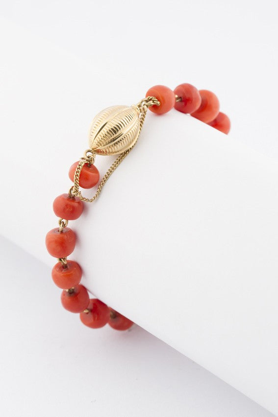 Blood coral bracelet strung on gold