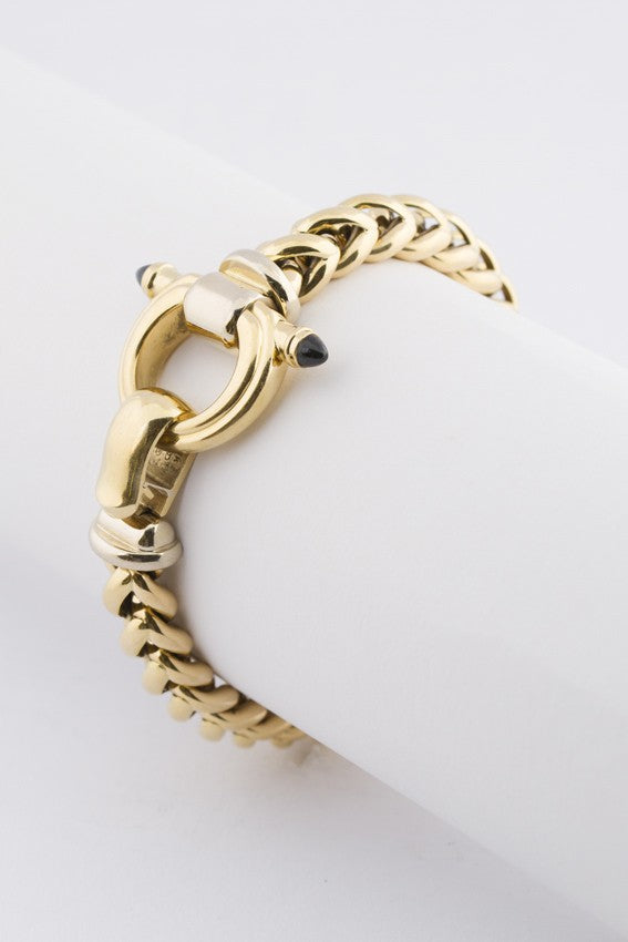 Gold link bracelet with sapphire in the clasp