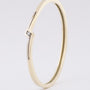 Wit/geel gouden bangle armband met briljant
