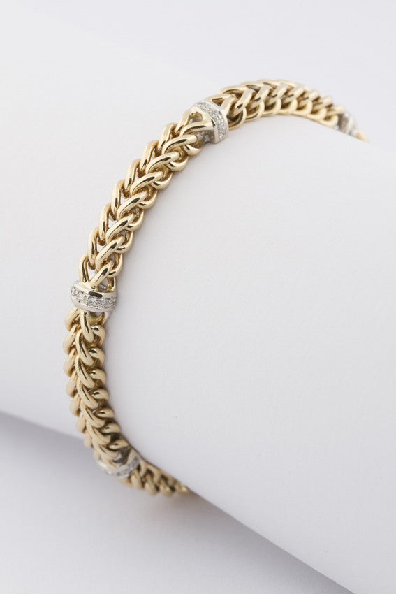 Massieve schakel armband met briljanten