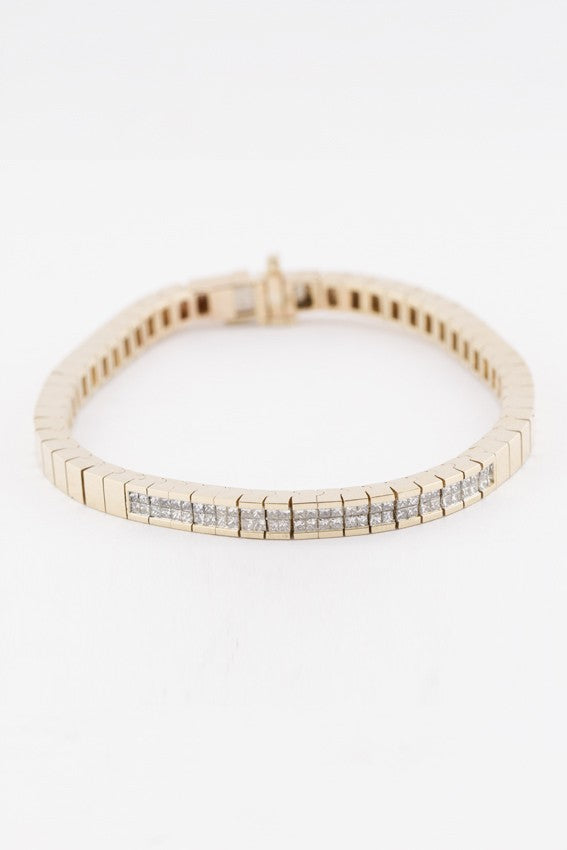 Gold link bracelet with princess cut diamonds