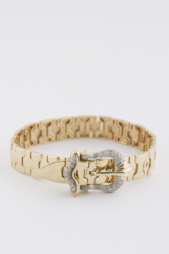 Gold buckle bracelet with diamonds