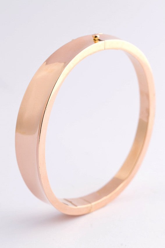 Gold slave bracelet with hinged clasp